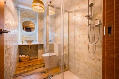 Un baño de Apto céntrico, 2 aparcamientos privados, bicis