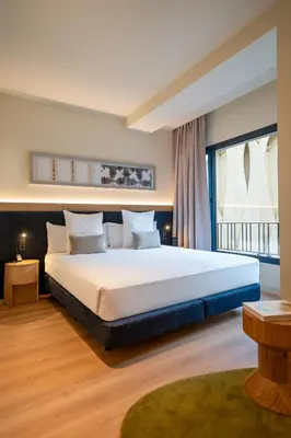 Cama o camas de una habitación en Ocean Drive Sevilla