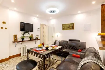 Una televisión o centro de entretenimiento en Precioso Apartamento centrico