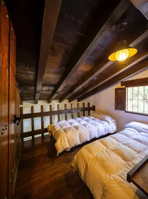 Cama o camas de una habitación en La Pedriza del Serval