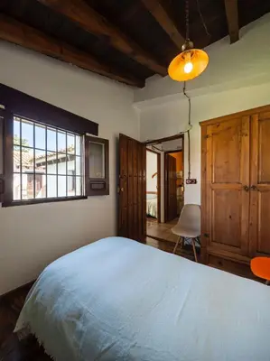 Cama o camas de una habitación en La Pedriza del Serval
