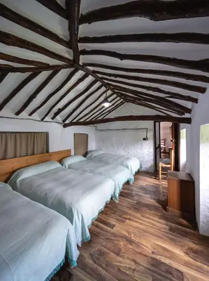 Cama o camas de una habitación en La Pedriza del Serval