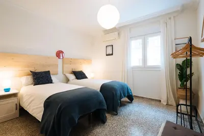 Cama o camas de una habitación en Muro de los Navarros Suite Apartment