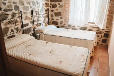 Cama o camas de una habitación en Casa Rural El Capricho de Flor