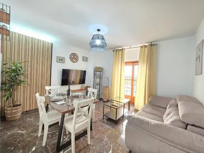 Una televisión o centro de entretenimiento en El Sagrario Apartamento céntrico con opción de parking junto a la Catedral