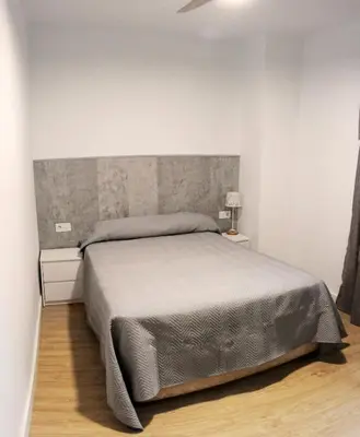 Cama o camas de una habitación en Apartamento Menina Santa Ana