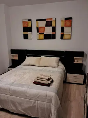 Cama o camas de una habitación en Centrico, Parking incluido