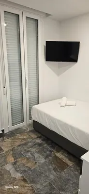 Cama o camas de una habitación en HOSTAL NERVION