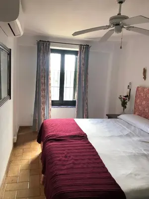 Cama o camas de una habitación en La Capellania de Alvear