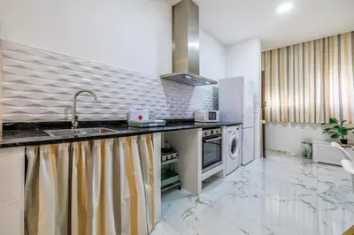 Una cocina o zona de cocina en Living Cordoba Apartamentos