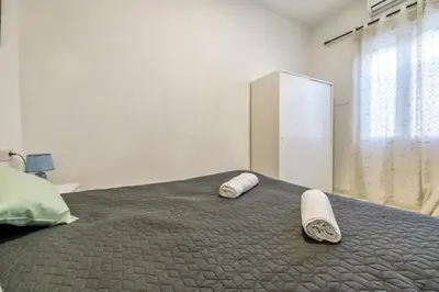 Cama o camas de una habitación en Living Cordoba Apartamentos