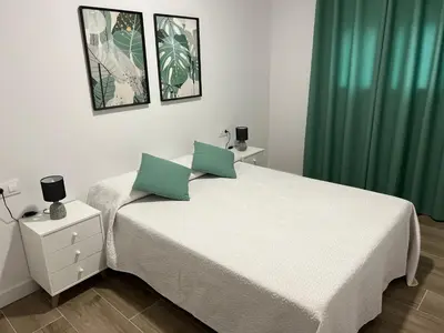 Cama o camas de una habitación en Ponce suite