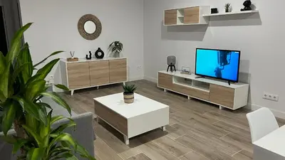 Una televisión o centro de entretenimiento en Ponce suite