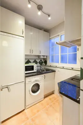 Una cocina o zona de cocina en Peral Home Cozy Apartment