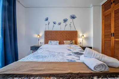 Cama o camas de una habitación en Zafiro Apartment&Parking in the historical centre