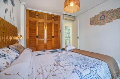 Cama o camas de una habitación en Zafiro Apartment&Parking in the historical centre