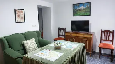 Una televisión o centro de entretenimiento en Casa típica Andaluza El Lucero