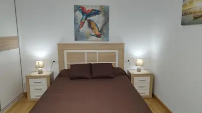 Cama o camas de una habitación en Apartamento Fuente del Genil.