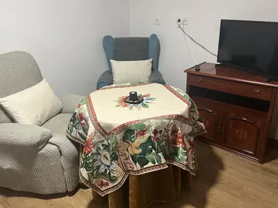 Una televisión o centro de entretenimiento en Casa Rufino