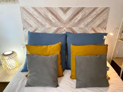 Cama o camas de una habitación en Inocentes Suite