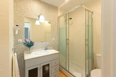Un baño de Juan de la Encina Central Suite
