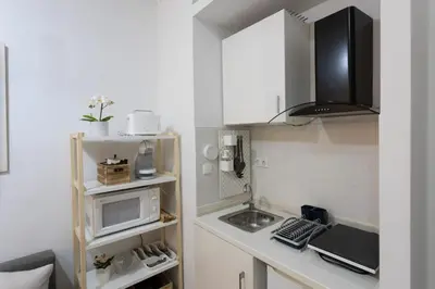 Una cocina o zona de cocina en WISH SUITE SANTA CLARA DE SEVILLA