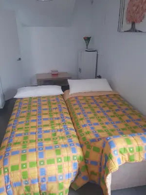 Cama o camas de una habitación en Casa Rosa1