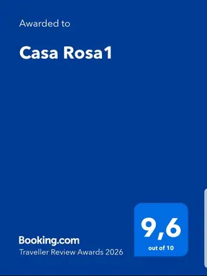 Certificado, premio, señal o documento que está expuesto en Casa Rosa1