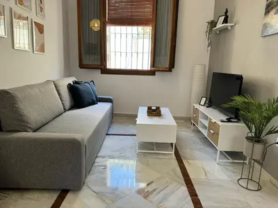 Una televisión o centro de entretenimiento en Apartamento Mundano