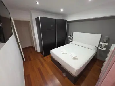 Cama o camas de una habitación en Magnífico alojamiento cerca de Mezquita catedral