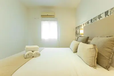 Cama o camas de una habitación en Bustos Tavera Suite