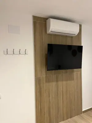 Una televisión o centro de entretenimiento en CASA MARTIN