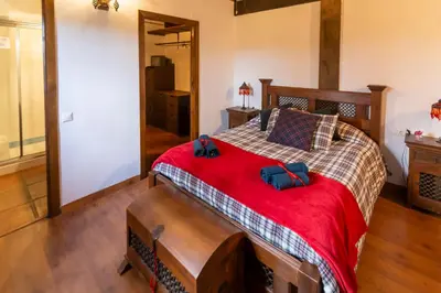 Cama o camas de una habitación en La Kasona del mirador