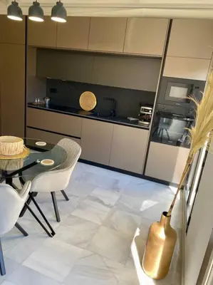 Una cocina o zona de cocina en Loft Puerta de Capitulares