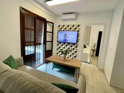 Una televisión o centro de entretenimiento en Geysotur Suite de Anabel