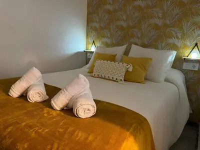 Cama o camas de una habitación en El Rincón de Manuela