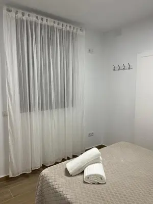 Cama o camas de una habitación en CASA MARTÍN