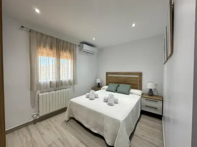 Cama o camas de una habitación en La Villa de Alba - Casa Rural en Montefrío