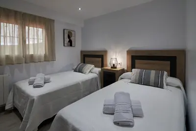 Cama o camas de una habitación en La Villa de Alba - Casa Rural en Montefrío