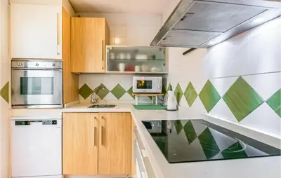 Una cocina o zona de cocina en 2 Bedroom Lovely Apartment In Cordoba