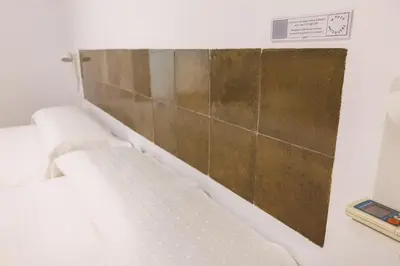 Cama o camas de una habitación en Arte de Cozina