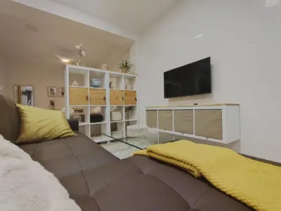 Una televisión o centro de entretenimiento en Aloja Córdoba