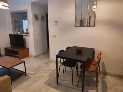 Una televisión o centro de entretenimiento en APARTAMENTO SAN LUIS. Plaza de Parking Gratis!!!