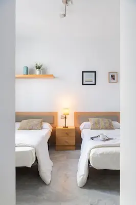 Cama o camas de una habitación en Apartamento con terraza en Sevilla centro by Rent Me