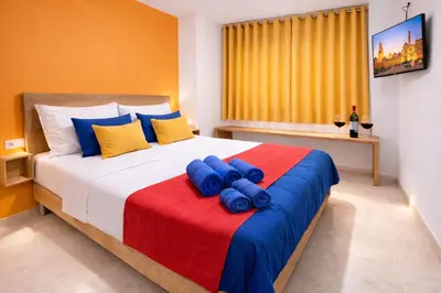 Cama o camas de una habitación en Apto T Patio Sevillano - Garaje privado con carga eléctrica