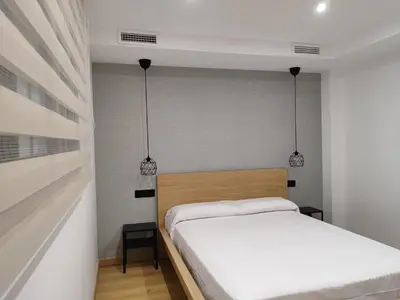 Cama o camas de una habitación en Fernando Quero 21