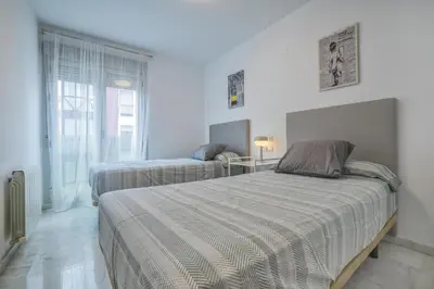 Cama o camas de una habitación en Verso Andaluz, Parking junto al centro