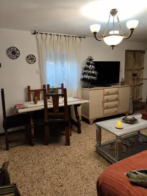 Una televisión o centro de entretenimiento en Casa Rural CUARTELILLOS