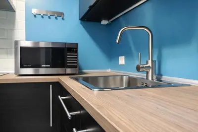 Una cocina o zona de cocina en CENTRICO Y ACOGEDOR APARTAMENTO CORDOBA