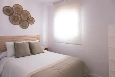 Cama o camas de una habitación en MRS Casita tentación con jacuzzi Privado